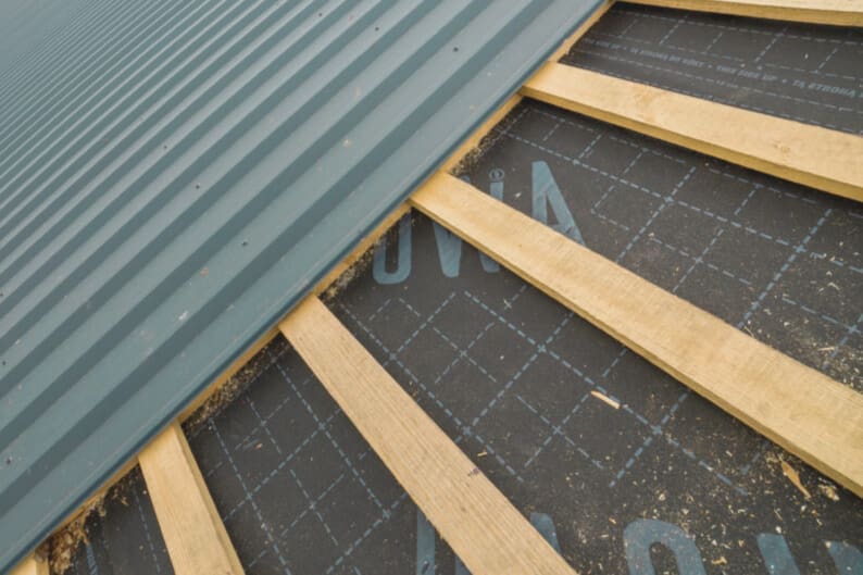 Peel and stick roof underlayment
